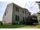 Large backyard with ample sunlight, a deck, and a covered porch area on a multi-story home at 5818 Myakka Ct, Raleigh, NC 27616