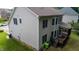 Exterior view of backyard, deck, screened porch, and back of the house at 5818 Myakka Ct, Raleigh, NC 27616