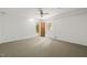 Basement room with carpeted floors, natural light, and access to the backyard; perfect for a home office at 601 Wofford Rd, Durham, NC 27707