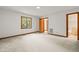 Bright bedroom featuring a window and neutral carpet at 601 Wofford Rd, Durham, NC 27707