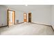 A spacious bedroom with neutral carpet at 601 Wofford Rd, Durham, NC 27707