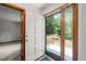 Well lit entryway with access to a deck at 601 Wofford Rd, Durham, NC 27707