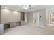 Bedroom with built-in desk area and shelving provides workspace and storage at 602 Preston Village Way, Cary, NC 27519
