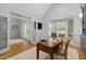 Bright office space featuring a wood desk, hardwood floors, and large windows at 602 Preston Village Way, Cary, NC 27519