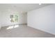 Well lit, carpeted bedroom features a window offering an outside view at 6069 Jones Cir, Sanford, NC 27332