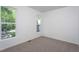 Bright bedroom with large windows offering plenty of natural light and neutral carpeting at 6069 Jones Cir, Sanford, NC 27332