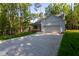 Exterior of house featuring garage and covered porch at 6069 Jones Cir, Sanford, NC 27332
