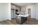 Bright, updated kitchen with an island, stainless appliances, and neutral color scheme at 6069 Jones Cir, Sanford, NC 27332