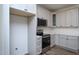 Beautiful kitchen with stainless steel appliances and white subway tile backsplash at 6069 Jones Cir, Sanford, NC 27332