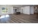 Spacious area combining living and dining, features modern floors and large windows at 6069 Jones Cir, Sanford, NC 27332