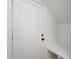 Bright mudroom features a bench with cubbies and a white door at 6069 Jones Cir, Sanford, NC 27332