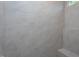 Tiled shower with seat and horizontal rectangular shower tiles at 6069 Jones Cir, Sanford, NC 27332