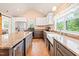 Modern kitchen with stainless steel appliances and custom cabinets at 6318 Hurdle Mills Rd, Roxboro, NC 27574