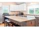 Elegant kitchen with an island, granite countertops, and stainless appliances at 6318 Hurdle Mills Rd, Roxboro, NC 27574