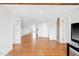 Open living area with hardwood floors and easy access to other parts of the home at 6318 Hurdle Mills Rd, Roxboro, NC 27574
