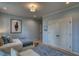 Bright bedroom with two beds, neutral palette and artwork at 633 Rolling Springs Dr, Cary, NC 27519