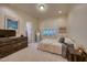 Cozy bedroom with a classic design, natural light, and wooden dresser at 633 Rolling Springs Dr, Cary, NC 27519
