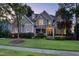 Charming craftsman home with stone accents, lush lawn and inviting front porch at 633 Rolling Springs Dr, Cary, NC 27519
