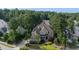 Charming two-story home with manicured lawn, stone accents, and a welcoming front porch at 633 Rolling Springs Dr, Cary, NC 27519