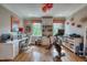 Well-lit home gym and office space with exercise equipment and functional storage at 633 Rolling Springs Dr, Cary, NC 27519