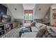Comfortable and stylish living room with a window seat and built in storage at 633 Rolling Springs Dr, Cary, NC 27519