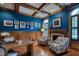 Charming home office featuring a fireplace, beautiful wood trim, and stylish decor at 633 Rolling Springs Dr, Cary, NC 27519