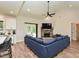 Open concept living room with a fireplace, dining area, and kitchen at 710 Country Rd, Middlesex, NC 27557