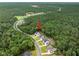 New construction is nestled among mature trees within a tranquil community at 720 The Parks Dr, Pittsboro, NC 27312