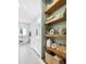 Spa-like bathroom featuring sleek fixtures, open shelving, and modern design at 720 The Parks Dr, Pittsboro, NC 27312