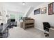 Bedroom featuring a lofted bed, desk area, and custom display shelving at 720 The Parks Dr, Pittsboro, NC 27312