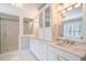 Bathroom featuring double vanity, marble countertop, cabinetry, and glass-enclosed shower at 7713 Summercrest Dr, Apex, NC 27539