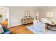 Open concept living room featuring modern decor and hardwood floors at 7713 Summercrest Dr, Apex, NC 27539