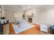 Inviting living room with hardwood floors, fireplace, and neutral decor at 7713 Summercrest Dr, Apex, NC 27539