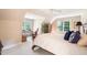 Spacious main bedroom featuring carpet floors, sitting area and a cozy workspace at 7713 Summercrest Dr, Apex, NC 27539