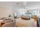 Bright main bedroom boasts wood floors, seating, large windows and a ceiling fan at 7713 Summercrest Dr, Apex, NC 27539