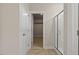 Well-lit bathroom featuring a glass-enclosed shower and access to a walk-in closet at 824 Stanly House St, Wake Forest, NC 27587
