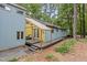 Charming home exterior featuring a porch and natural surroundings at 908 Cedar Fork Trl, Chapel Hill, NC 27514