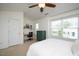 Bedroom with desk, natural light, a ceiling fan, and neutral carpet at 979 Branch Line Ln, Apex, NC 27502