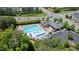 Aerial view of the community pool with lounge seating and nearby parking at 979 Branch Line Ln, Apex, NC 27502