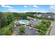 Aerial view of the community pool and clubhouse with ample parking at 979 Branch Line Ln, Apex, NC 27502