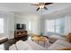 Bright living room features hardwood floors, a comfortable sectional sofa, and an open concept design at 979 Branch Line Ln, Apex, NC 27502