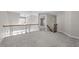 Second floor landing with an overlooking balcony at 103 Aisling Ct, Cary, NC 27513