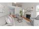 Spacious living room boasts a fireplace, high ceilings, and ample natural light at 103 Aisling Ct, Cary, NC 27513