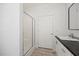 Bathroom featuring a shower and vanity with a black countertop at 1065 Shuford Rd, Wake Forest, NC 27587