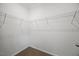 Walk-in closet featuring wall-mounted storage racks at 1065 Shuford Rd, Wake Forest, NC 27587