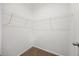Walk-in closet with ample wall-mounted storage racks at 1065 Shuford Rd, Wake Forest, NC 27587