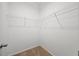 Walk-in closet with ample wall-mounted storage racks at 1065 Shuford Rd, Wake Forest, NC 27587
