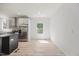 Eat-in kitchen with stainless steel appliances and a view to the backyard at 1065 Shuford Rd, Wake Forest, NC 27587