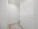 Functional walk-in closet with ample shelving and clean design at 1065 Shuford Rd, Wake Forest, NC 27587