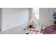 Bright bedroom features a teepee, cozy seating, and plenty of room for play at 1103 Mallory Ln, Durham, NC 27713